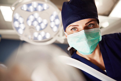 Portrait of female anesthesiologist in operating room