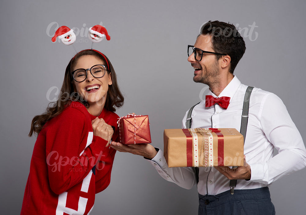 Funny man giving the Christmas gift
