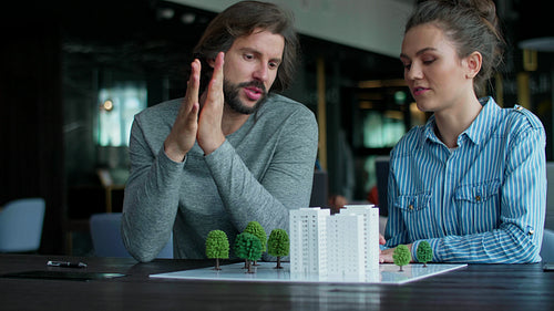 Architectural model and young adults architects