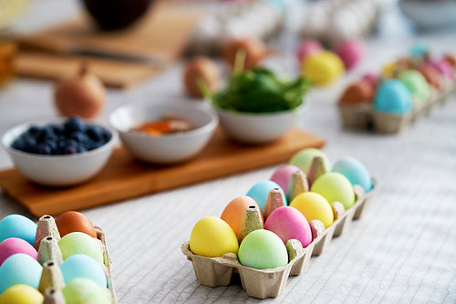 Close up of cartons of naturally dyeing Easter eggs