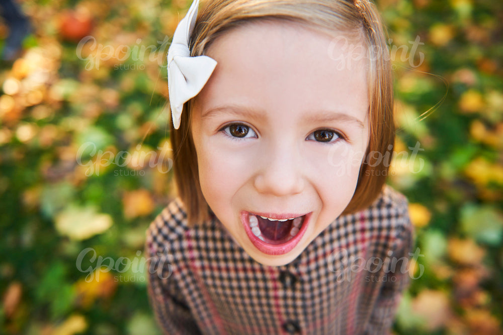Portrait of charming girl shouting