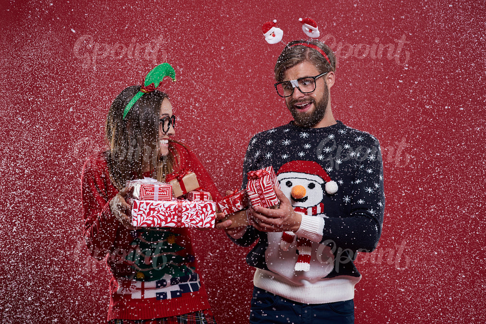 Christmas nerd couple with presents