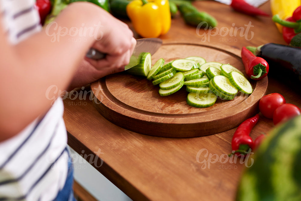 Wooden board and freshness cucumber slices