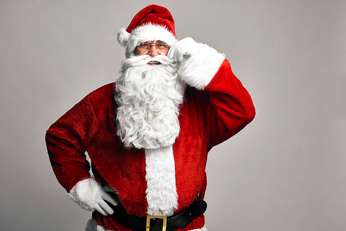 Portrait of caucasian Santa Claus on grey background