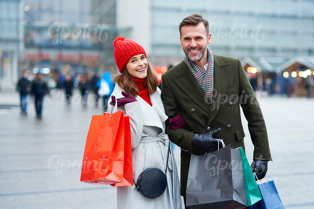 Couple with shopping bags in the city