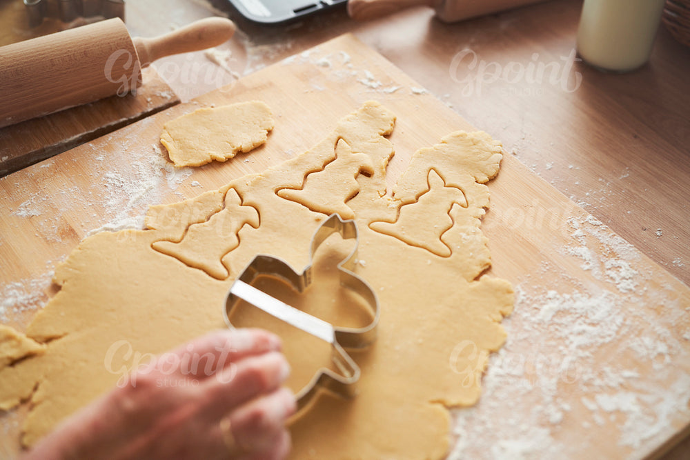 Close up of cutting rabbit shapes out of pastry dough