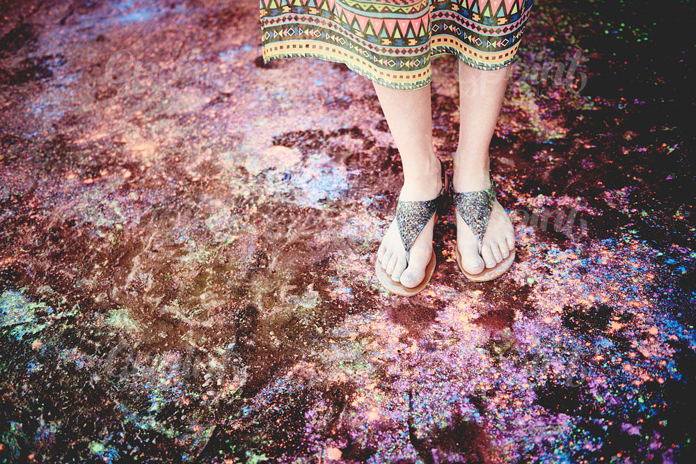 Woman's legs in holi colors