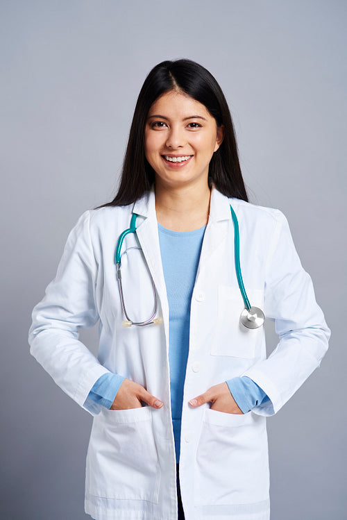 Vertical image of Asian female doctor