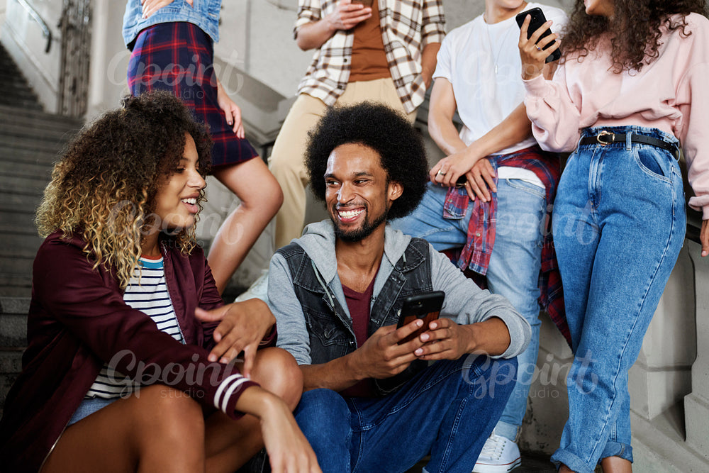 Group of young friends spending time together