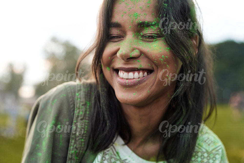 Portrait of multiracial woman at Holi Festival