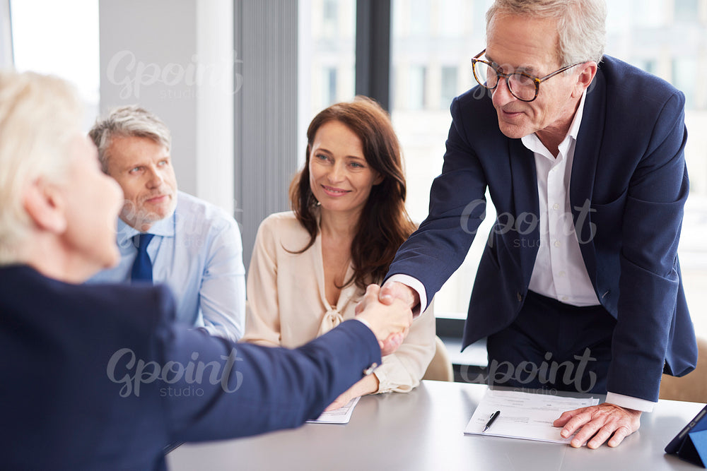 Good deal between business partners during business meeting