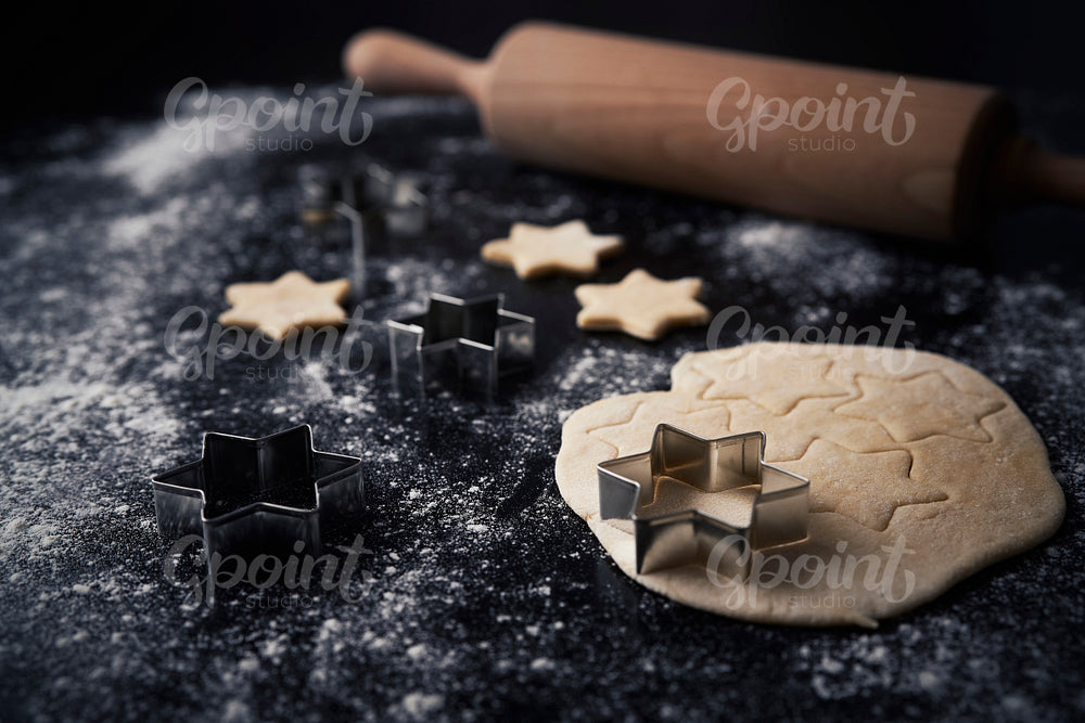 Close up of raw cookies on black background