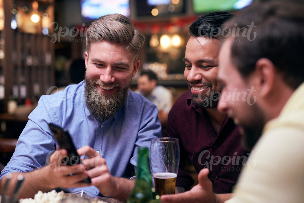 Two men spending good time in the pub