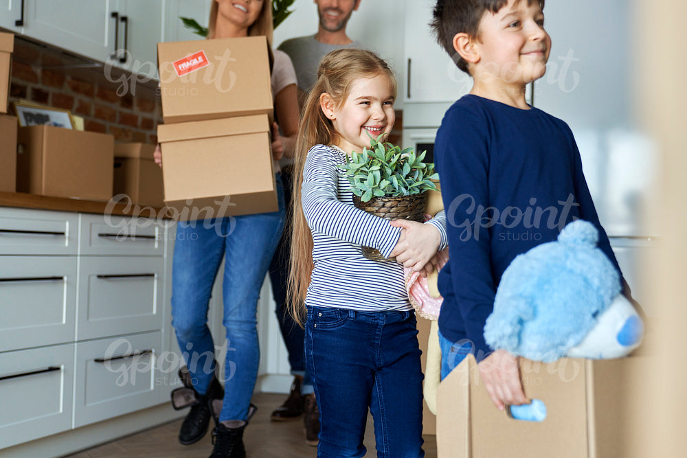 Happy family moving to a new home