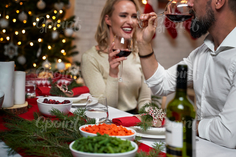 Couple spending good time at Christmas dinner
