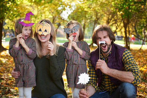 Portrait of family in Halloween masks