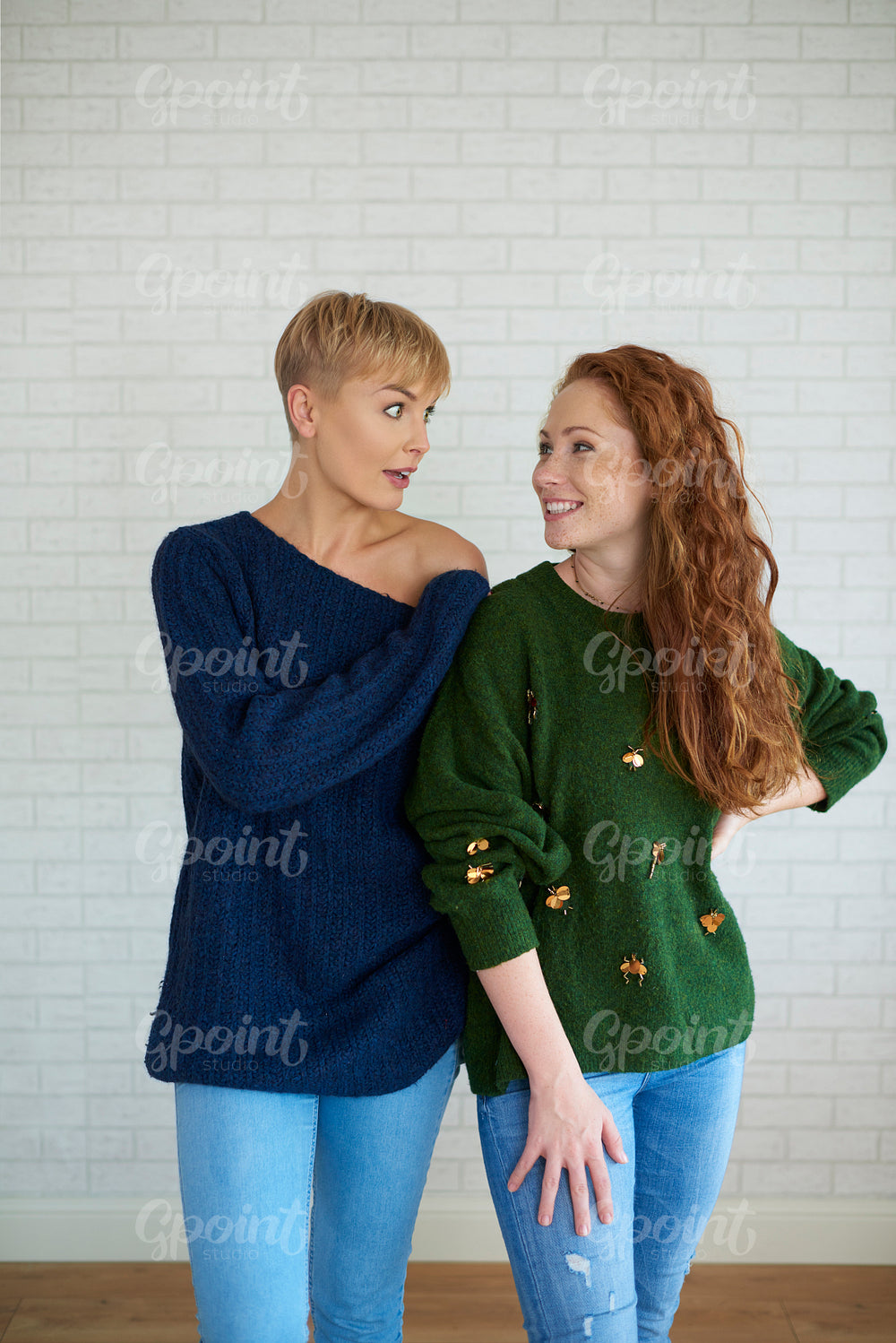Front view of two young woman talking