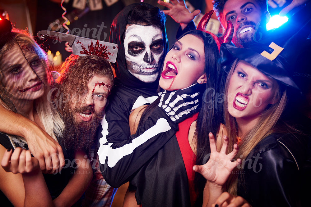 Spooky costumes of party people