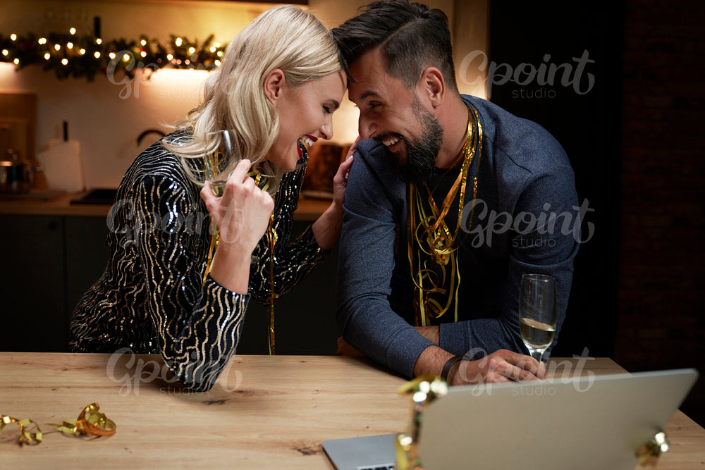Couple have fun during at the New Year's Eve party