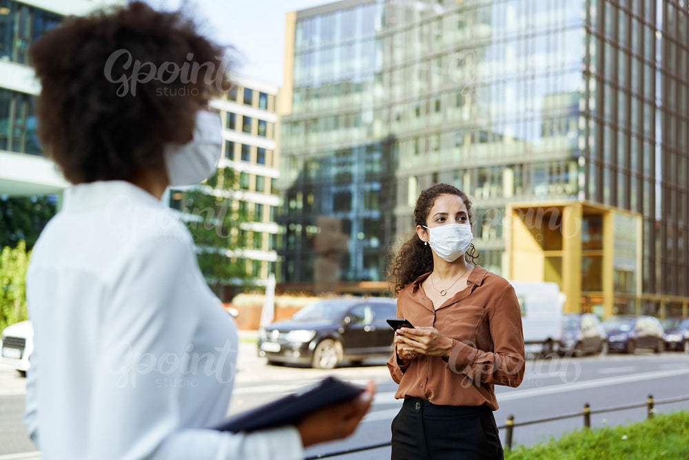People in face masks on the city street