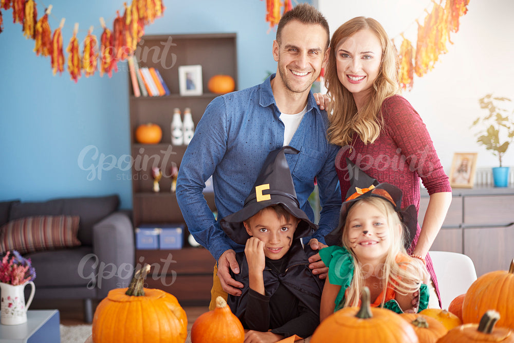 Family spending Halloween together at home