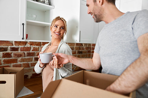 Smiling couple during moving house