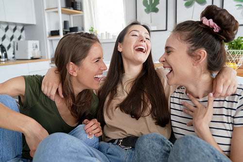 Three best friends having a good time laughing