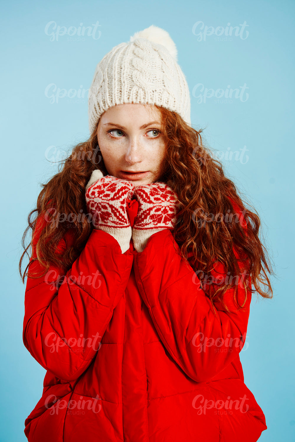 Portrait of young girl shivering with cold