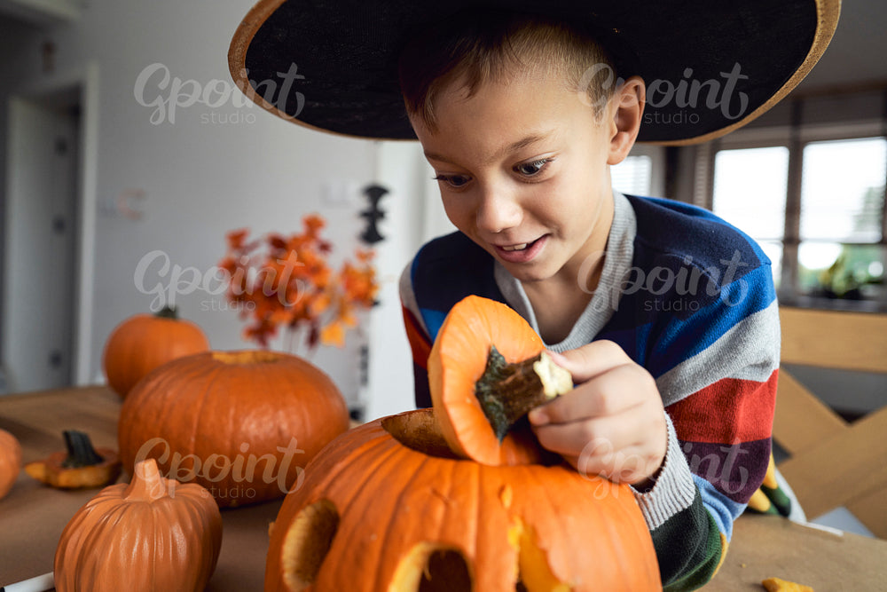 Little boy with Halloween's pumpkin 