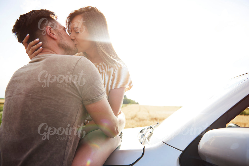 Loving couple kissing and embracing