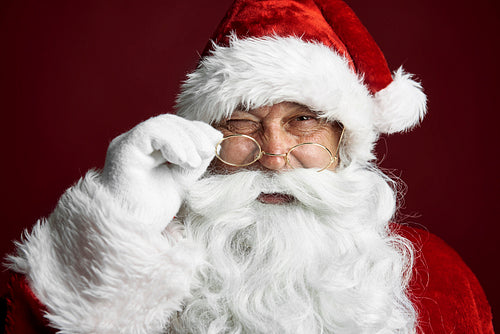 Cute Santa Claus winking  the eye