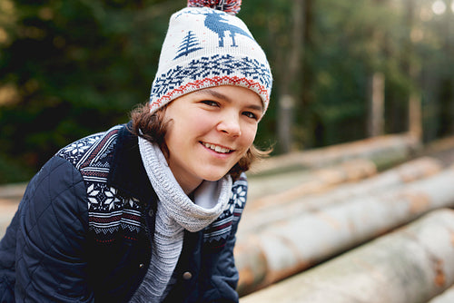 Portrait of smiling teenage boy in wintertime