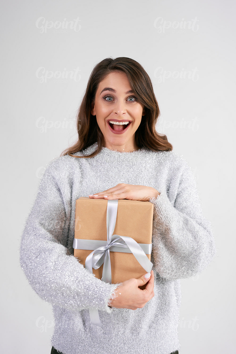 Portrait of screaming woman with gift
