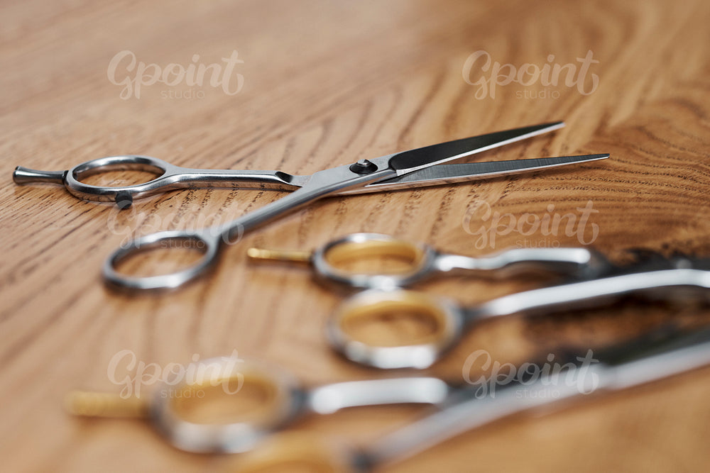 Close up of professional scissors in hair salon