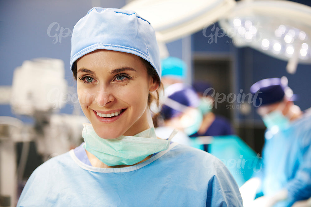 Portrait of female surgeon in operating room