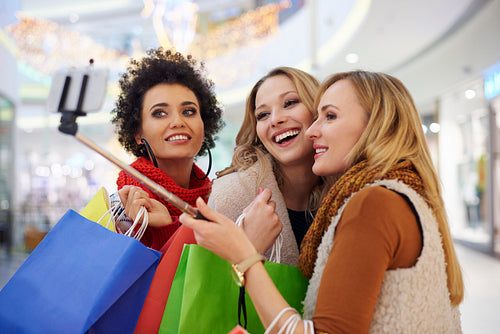 Women taking selfie in the shopping mall