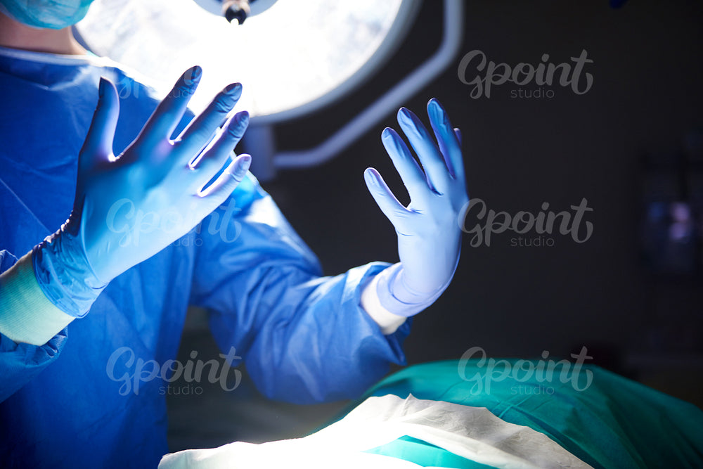 Hands of surgeon before the operation