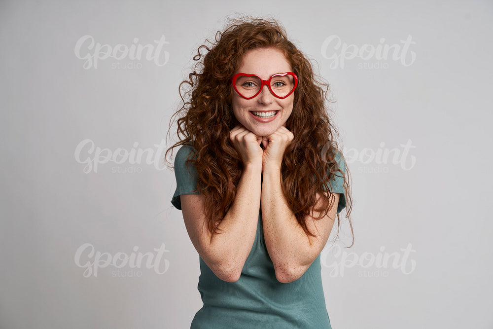 Cute redhead girl in funny glasses 