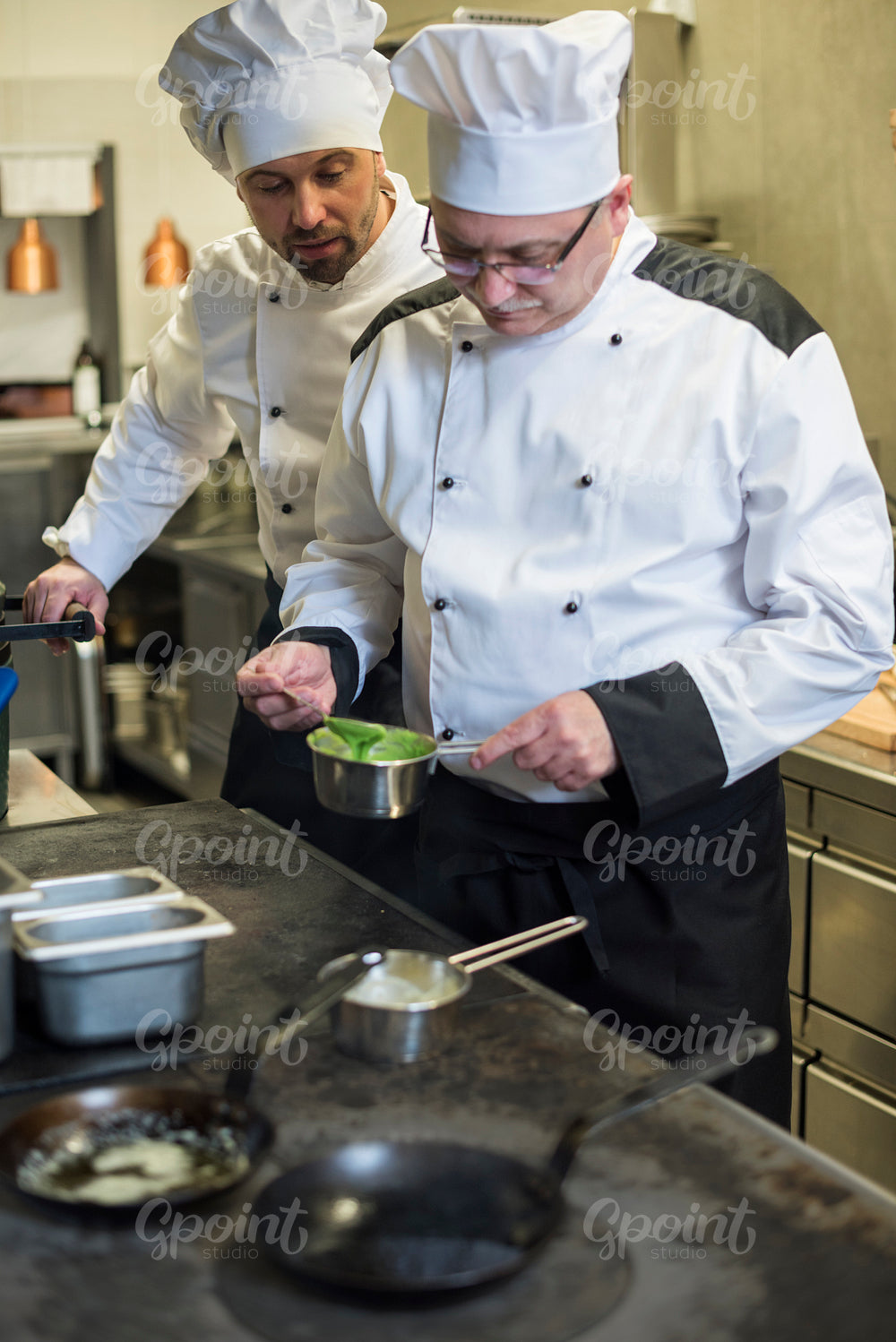 Cook learning from the chef