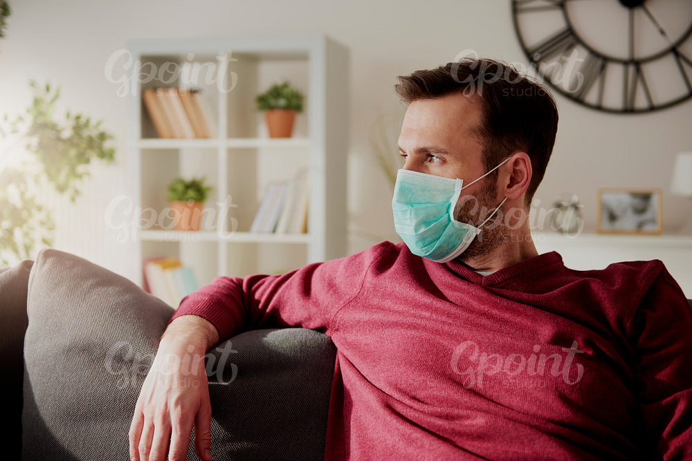 Thoughtful man in face mask