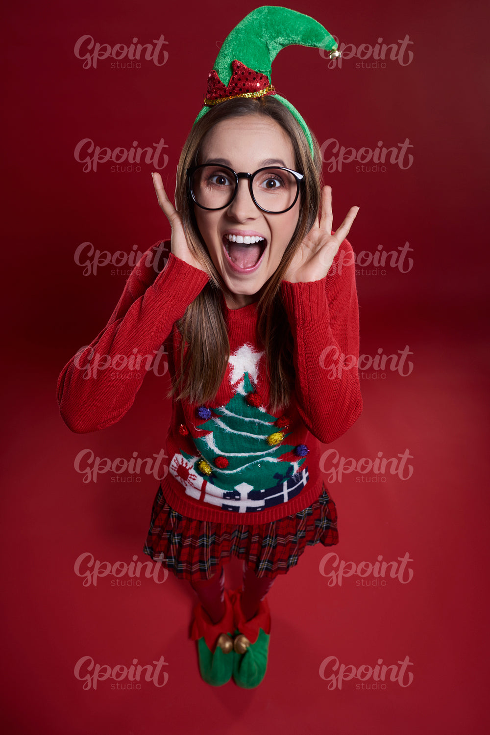 Shouting woman on red background