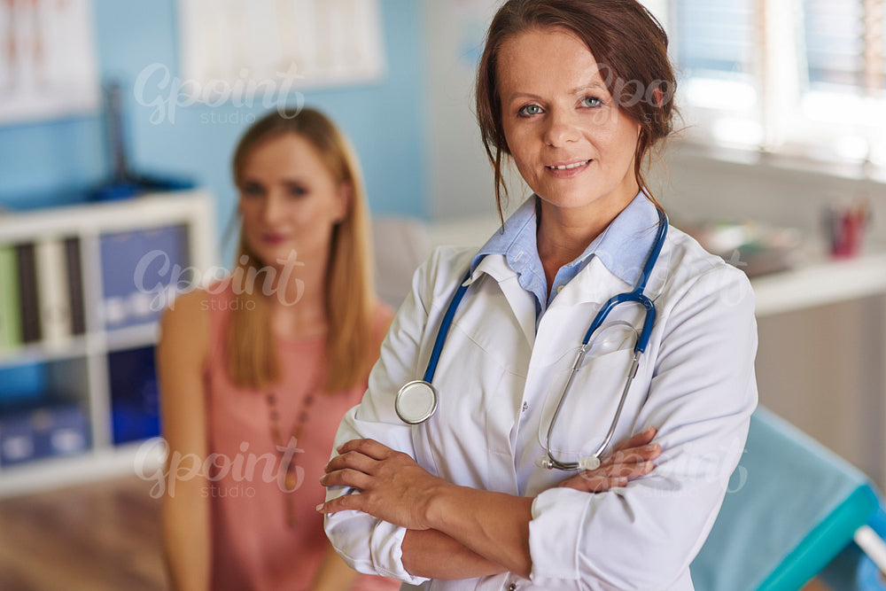 Portrait of a doctor and on of her patients