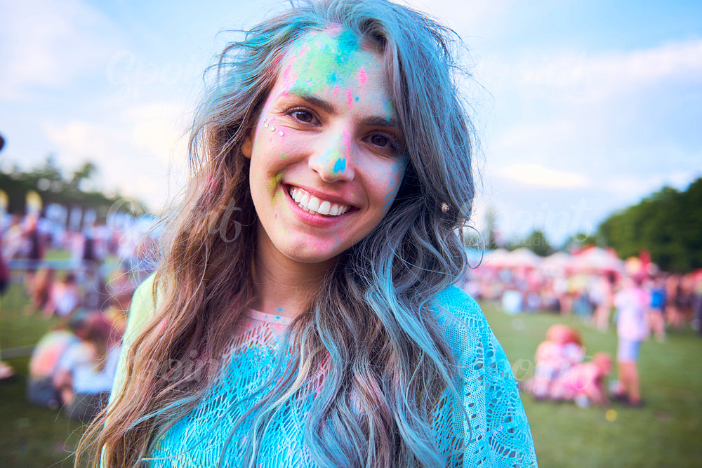 Portrait of colorful woman celebrating summer