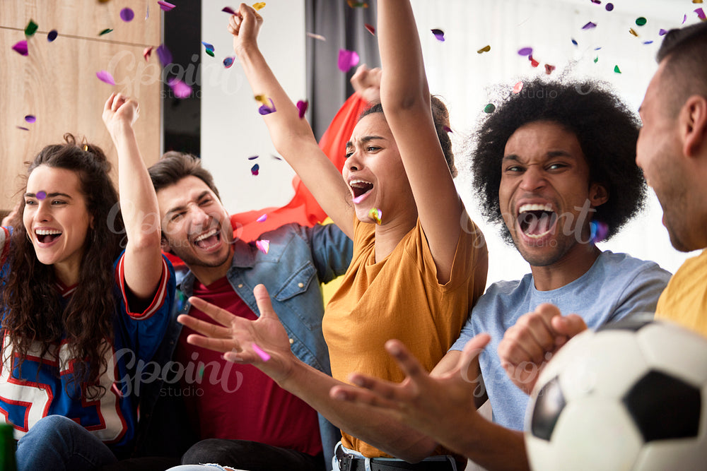 Football fans celebrating the victory of their team