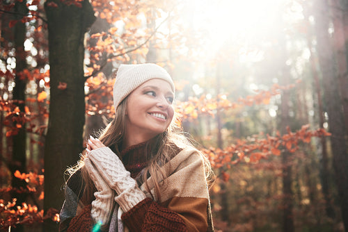 Beautiful young woman in autumnal forest