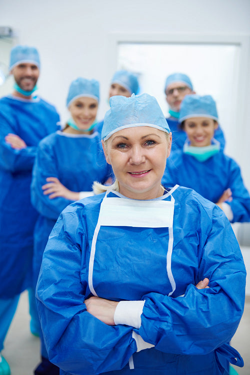 Mature woman as the leader of doctors team