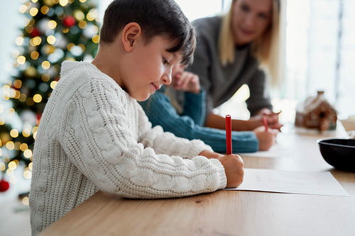 Children writing a letter to Santa Claus