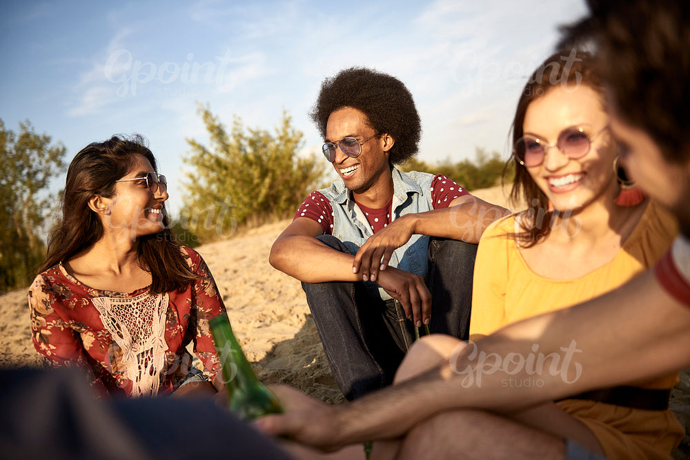 Friends spending time on a sunny day at the beach