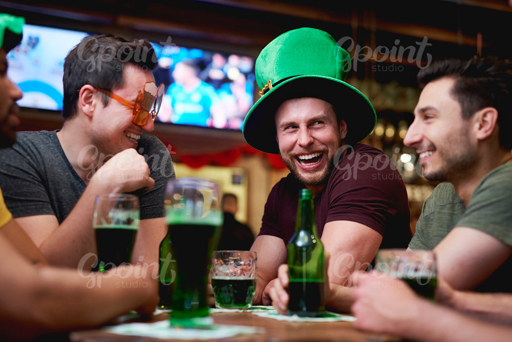 Group of men enjoying time together in the pub