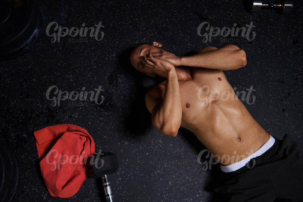 High angle view of exhausted male athlete